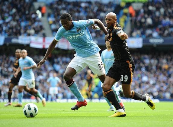 Football - Barclays Premiership - Manchester City (blue) vs. FC Chelsea (black) --- Manchester City s Dedryck Boyata and FC Chelsea s Nicolas Anelka in action at the City of Manchester Stadium, Manchester 