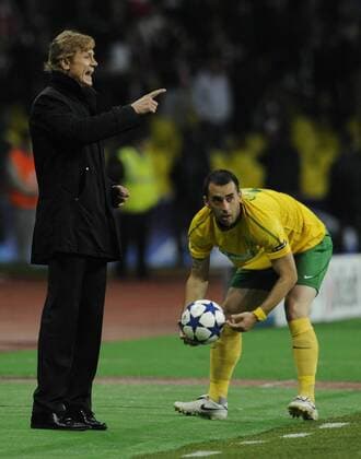 Moscow - SEPTEMBER 28, 2010. Spartak Moscow s Head Coach Valery Karpin (L) and MSK Zilina s Lubomir Guldan seen during a Champions League game.  X00004B2