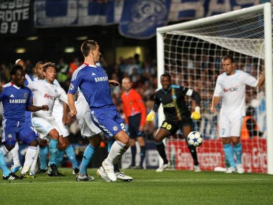 Chelsea s John Terry (C) scoring his sides opening goal - Champions League Group F - Chelsea FC (blue) v Olympique Marseille - 28th September, 2010 EDITORIAL USE ONLY. No use with unauthorised audio, video, data, fixture lists, club league logos or live services. Online in-match use limited to 120 images, no video emulation. No use in betting, games or single club league player publications.