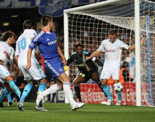 Chelsea s John Terry (C) scoring his sides opening goal - Champions League Group F - Chelsea FC (blue) v Olympique Marseille - 28th September, 2010 EDITORIAL USE ONLY. No use with unauthorised audio, video, data, fixture lists, club league logos or live services. Online in-match use limited to 120 images, no video emulation. No use in betting, games or single club league player publications.