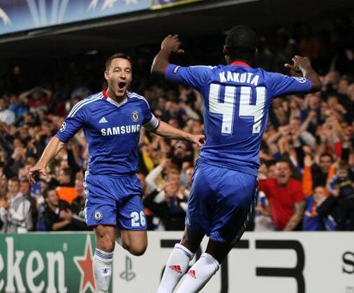 Chelsea s John Terry celebrates (L) scoring his sides opening goal with Gael Kakuta - Champions League Group F - Chelsea FC (blue) v Olympique Marseille - 28th September, 2010 EDITORIAL USE ONLY. No use with unauthorised audio, video, data, fixture lists, club league logos or live services. Online in-match use limited to 120 images, no video emulation. No use in betting, games or single club league player publications.