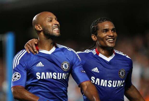 Chelsea s Nicholas Anelka (L) celebrates scoring his sides second goal with Florent Malouda - Champions League Group F - Chelsea FC (blue) v Olympique Marseille - 28th September, 2010 EDITORIAL USE ONLY. No use with unauthorised audio, video, data, fixture lists, club league logos or live services. Online in-match use limited to 120 images, no video emulation. No use in betting, games or single club league player publications.