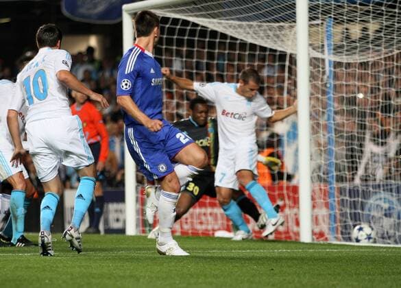 Chelsea s John Terry (C) scoring his sides opening goal - Champions League Group F - Chelsea FC (blue) v Olympique Marseille - 28th September, 2010 EDITORIAL USE ONLY. No use with unauthorised audio, video, data, fixture lists, club league logos or live services. Online in-match use limited to 120 images, no video emulation. No use in betting, games or single club league player publications.