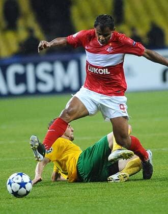 MOSCOW, MSK Zilina s Mario Pecalka and Spartak Moscow s Ari (top) seen during the Champions League Group F football match in Moscow. Spartak won 3-0.  RE0D8CB1