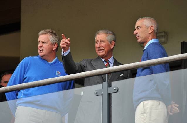 Golf - Ryder Cup 2010 - Practice Day 2 - Charles - The Prince of Wales (C) chats to Europe team captain Colin Montgomerie (SCO, L) and US team captain Corey Pavin (USA) at Celtic Manor, Newport 