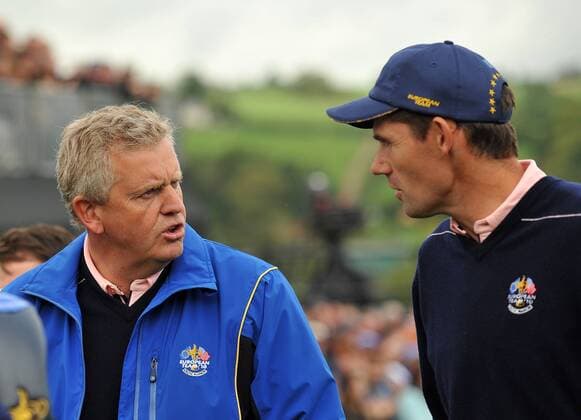 Golf - Ryder Cup 2010 - Practice Day 3 Colin Montgomerie l. SCO talks to Padraig Harrington Ireland of Europe during practice at Celtic Manor, Newport 