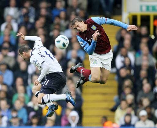Tottenhams Rafael Van Der Vaart (L) tussles with Villas Stephen Warnock Barclays Premier League Tottenham Hotspur v Aston Villa 2nd October, 2010 EDITORIAL USE ONLY. No use with unauthorised audio, video, data, fixture lists, club league logos or live services. Online in-match use limited to 120 images, no video emulation. No use in betting, games or single club league player publications.
