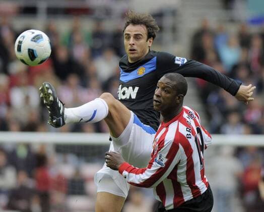 Sunderland s Titus Bramble (R) and Manchester United s Dimitar Berbatov. Barclays Premier League Sunderland v Manchester United 2nd October, 2010 EDITORIAL USE ONLY. No use with unauthorised audio, video, data, fixture lists, club league logos or live services. Online in-match use limited to 120 images, no video emulation. No use in betting, games or single club league player publications. o0 FC AFC ManU