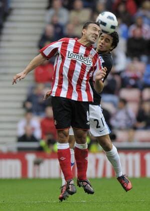 Sunderland s Steed Malbranque (L) and Manchester United s Rafael da Silva. Barclays Premier League Sunderland v Manchester United 2nd October, 2010 EDITORIAL USE ONLY. No use with unauthorised audio, video, data, fixture lists, club league logos or live services. Online in-match use limited to 120 images, no video emulation. No use in betting, games or single club league player publications. o0 FC AFC ManU