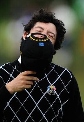 Golf - Ryder Cup 2010 - Day 2 Foursomes Rory McIlroy (Northern Ireland) of Europe reacts as they lose their match on the last hole at Celtic Manor, Newport 
