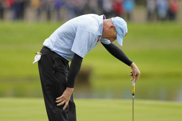 Golf - Ryder Cup 2010 - Day Three Jim Furyk (USA) hangs his head after missing a putt at Celtic Manor, Newport 