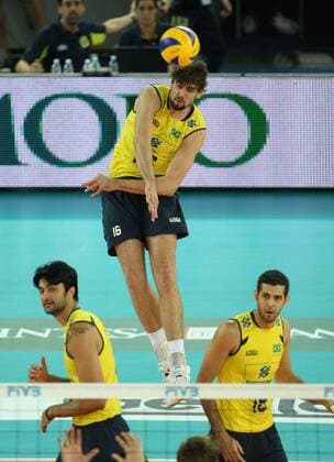 Saatkamp Lucas of Brazil serves the ball Brazil (yellow) vs. Germany (black) xMarcoxMegax  ActionPlus11101145 Content restricted for UK based newspaper