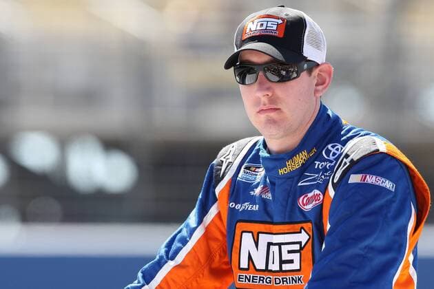 Oct. 9, 2010 - Fontana, California, United States of America - Nationwide Series driver Kyle Busch driver of the 18 car before the start of the CampingWorld.com 300 at the Auto Club Speedway.  - ZUMAx72