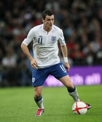 Englands Adam Johnson in action, England (white) - Montenegro (red) EDITORIAL USE ONLY. No use with unauthorised audio, video, data, fixture lists, club league logos or live services. Online in-match use limited to 120 images, no video emulation. No use in betting, games or single club league player publications.