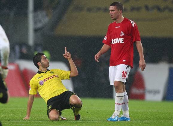 15.10.2010, Köln, 1.Bundesliga, Saison 2010 2011, 1.FC Köln - Borussia Dortmund (BVB), Dortmunds Nuri Sahin (li.) provoziert Lukas Podolski (1. FC Köln) o0 Freud und Leid, Jubel, Freude