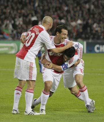 Luis Suarez r. scores 2-0 and celebrates with Demy de Zeeuw l. and Mounir El Hamdaoui Ajax - Ajax Amsterdam vs AJ Auxerre  o0 Jubel Freude