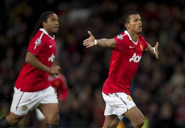 Nani (R) of Manchester United celebrates scoring with Anderson - UEFA Champions League Group C Manchester United v Bursaspor 20th October, 2010 EDITORIAL USE ONLY. No use with unauthorised audio, video, data, fixture lists, club league logos or live services. Online in-match use limited to 120 images, no video emulation. No use in betting, games or single club league player publications.
