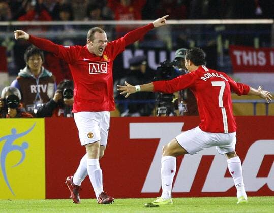 Wayne Rooney (L) celebrates with Cristiano Ronaldo (both ManU) after his goal on 73 mins. Liga de Quito - Manchester United - Final of FIFA Club World Cup Japan 2008 at International Stadium Yokohama in Japan - 