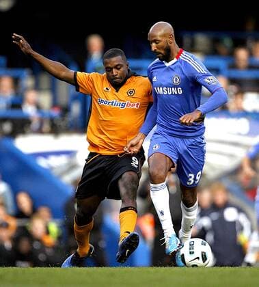 Nicolas Anelka of Chelsea holds off Sylvan Ebanks-Blake of Wolverhampton Wanderers - Barclays Premier League Chelsea FC (blue) v Wolverhampton Wanderers (orange) 23rd October, 2010 EDITORIAL USE ONLY. No use with unauthorised audio, video, data, fixture lists, club league logos or live services. Online in-match use limited to 120 images, no video emulation. No use in betting, games or single club league player publications.