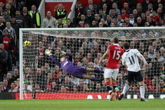 Football - Premier League - Manchester United vs. Tottenham Hotspur A shot from Tottenham s Rafael van der Vaart r. stretches Edwin van der Sar of Manchester United Manu but hits the post at Old Trafford 