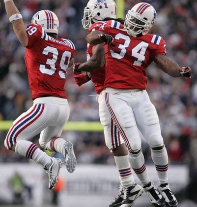 New England Patriots running backs Danny Woodhead (39), BenJarvus Green-Ellis (C) and Sammy Morris (34) celebrate a touchdown by Woodhead in the second quarter against the Minnesota Vikings at Gillette Stadium in Foxboro, Massachusetts on October 31, 2010. The Patriots defeated the Vikings 28-18.  BOS2010103123