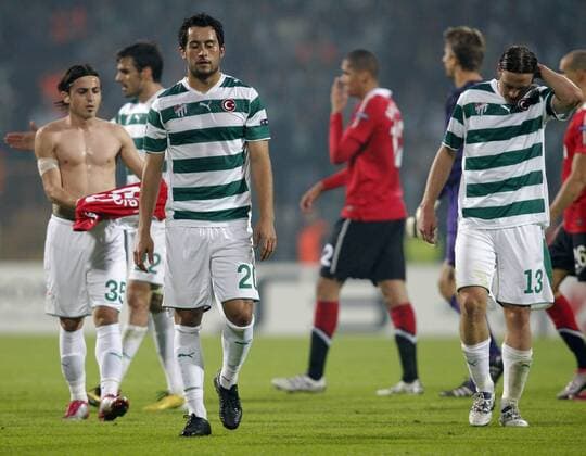 UEFA Champions League group C soccer match between Bursasport and Manchester United ManU at Ataturk Stadium in Bursa, 02.11.2010 Mancherter United won scored 3 - 0 Pictured: Ozan Ipek (L) and Gustav Svessons (R) of Bursasport. 