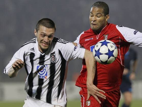 FC Partizan player Ivica Ilijev, left in action against FC Braga player Alberto Rodriguez, right, during their Group H UEFA Champions League match in Belgrade, Serbia, Wednesday, Nov. 3, 2010. PARTIZAN BELGRAD vs SC Sporting Braga.  PARTIZAN-BRAGA_10