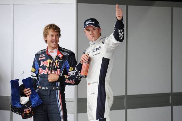 FIRST POLE POSITION FOR GERMAN NICO HÜLKENBERG (right) ON WILLIAMS FW32 , HERE WITH OTHER GERMAN SEBASTIAN VETTEL HAVING SECOND TIME ON RED BULL RB6  BernardAsset o0 Jubel Freude Qualifying