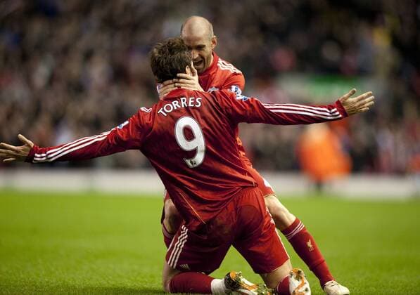Fernando Torres (9) of Liverpool celebrates his second goal with teammate Raul Meireles - Liverpool FC vs. Chelsea FC EDITORIAL USE ONLY. No use with unauthorised audio, video, data, fixture lists, club league logos or live services. Online in-match use limited to 120 images, no video emulation. No use in betting, games or single club league player publications.