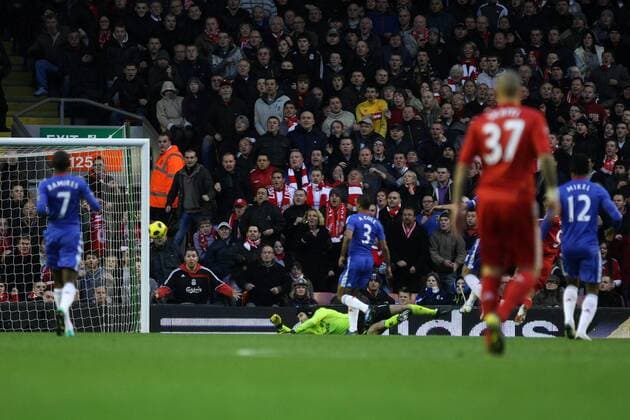 Liverpool FC vs. Chelsea FC London - Petr Cech (2.L) of Chelsea looks on as the ball fly s in the net for Liverpool first goal at Anfield 