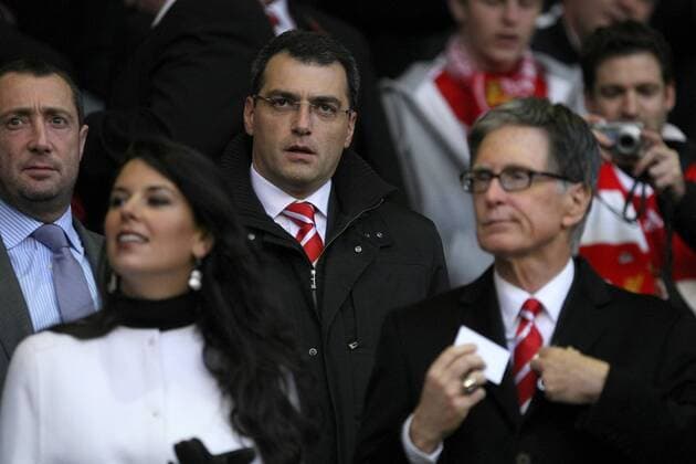 Liverpool FC vs. Chelsea FC London - Liverpool s director of football strategy Damien Comolli (C) pictured with owner John W Henry (R) and partner at Anfield 
