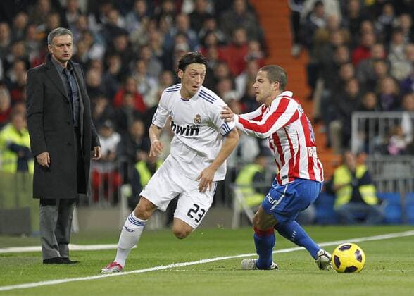 Madrid.- (07 10 10). Mesut Özil c. and Dominguez with Real Coach Jose Mourinho l. Real Madrid (White) vs Atletico Madrid (Red)  (20153364)