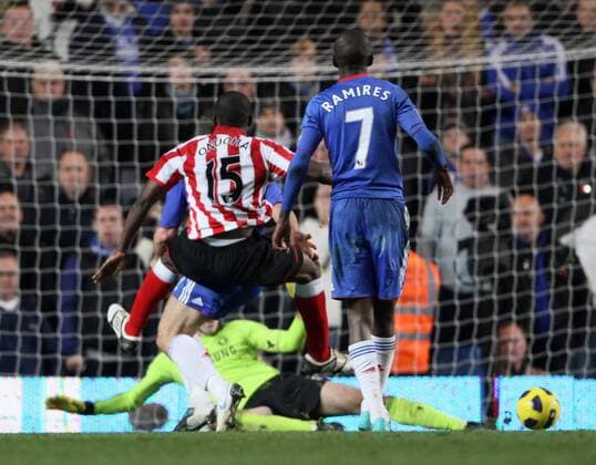 Sunderlands Nedum Onuoha puts his side one nil up against Chelseas Ramires --- Barclays Premier League - FC Chelsea London (blue) vs FC Sunderland (red stripes), 14th November, 2010 EDITORIAL USE ONLY. No use with unauthorised audio, video, data, fixture lists, club league logos or live services. Online in-match use limited to 120 images, no video emulation. No use in betting, games or single club league player publications.