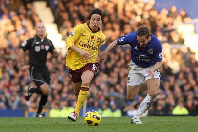 14.11.2010, Liverpool - Premier League 2010 2011 - FC Everton (blue) vs FC Arsenal London (yellow) --- Arsenal s Samir Nasri escapes Phil Jagielka of Everton Goodison Park 