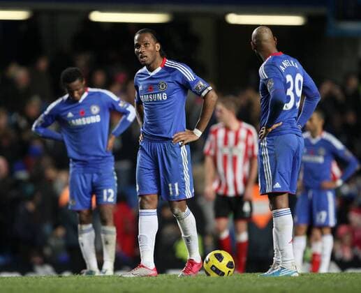 FC Chelseas Didier Drogba (C) looks on dejected as his side goes 3-0 down - Premier League - FC Chelsea (blue) vs AFC Sunderland 14th November, 2010 - EDITORIAL USE ONLY. No use with unauthorised audio, video, data, fixture lists, club league logos or live services. Online in-match use limited to 120 images, no video emulation. No use in betting, games or single club league player publications.
