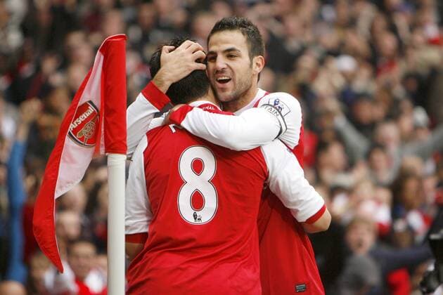 Arsenal FC London (red) - Tottenham Hotspur (white), Arsenal s Samir Nasri (8) and Cesc Fabregas celebrates scoring  o0 Jubel, Freude