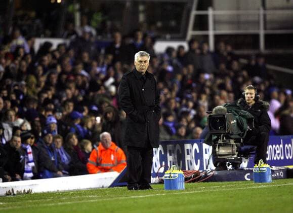 FC Chelsea coach Carlo Ancelotti stands alone on the touchline, Barclays Premier League Birmingham City v FC Chelsea (green) 20th November, 2010 EDITORIAL USE ONLY. No use with unauthorised audio, video, data, fixture lists, club league logos or live services. Online in-match use limited to 120 images, no video emulation. No use in betting, games or single club league player publications.