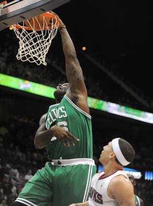 Nov. 22, 2010 - Atlanta, Georgia, U.S. - Boston Celtics center SHAQUILLE O NEAL ( 36) dunks the ball over Atlanta Hawks guard MIKE BIBBY ( 10) in the first half at Philips Arena. The Celtics defeated the Hawks 99-76. - ZUMAl17