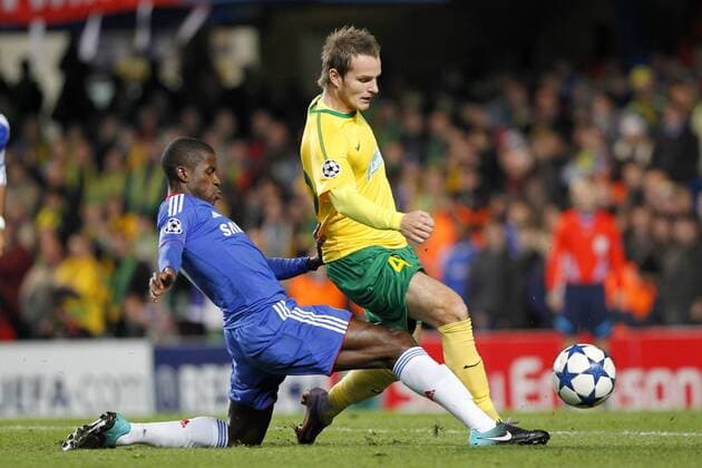 Football - Champions League - FC Chelsea (blue) vs. MSK Zilina (yellow) --- Chelsea s Gael Kakuta tacles MSK Zilina s Roman Gergel at Stamford Bridge 
