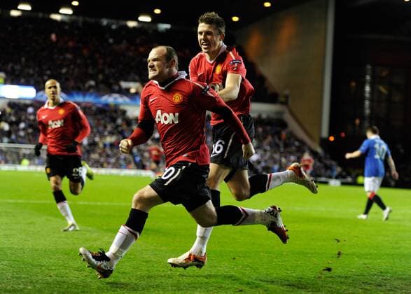 Wayne Rooney (L) of Manchester United celebrates his goal with Michael Carrick of Manchester United, Glasgow Rangers - Manchester United (ManU) EDITORIAL USE ONLY. No use with unauthorised audio, video, data, fixture lists, club league logos or live services. Online in-match use limited to 120 images, no video emulation. No use in betting, games or single club league player publications. o0 Jubel, Freude