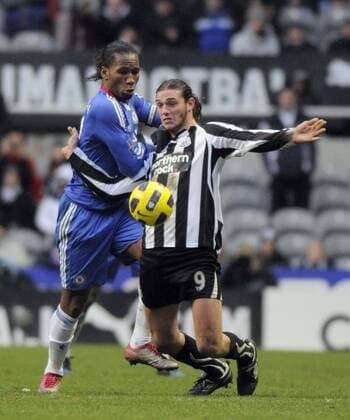 Newcastle United (R) s Andy Carroll and Chelsea s Didier Drogba. Barclays Premier League, Newcastle United v Chelsea FC London, 28th November, 2010 EDITORIAL USE ONLY. No use with unauthorised audio, video, data, fixture lists, club league logos or live services. Online in-match use limited to 120 images, no video emulation. No use in betting, games or single club league player publications.