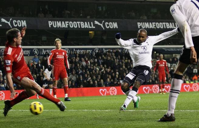 Tottenhams Jermain Defoe sees his shot blocked by Liverpools Jamie Carragher - Barclays Premier League Tottenham Hotspur (white) v Liverpool FC (red) 28th November, 2010 EDITORIAL USE ONLY. No use with unauthorised audio, video, data, fixture lists, club league logos or live services. Online in-match use limited to 120 images, no video emulation. No use in betting, games or single club league player publications.