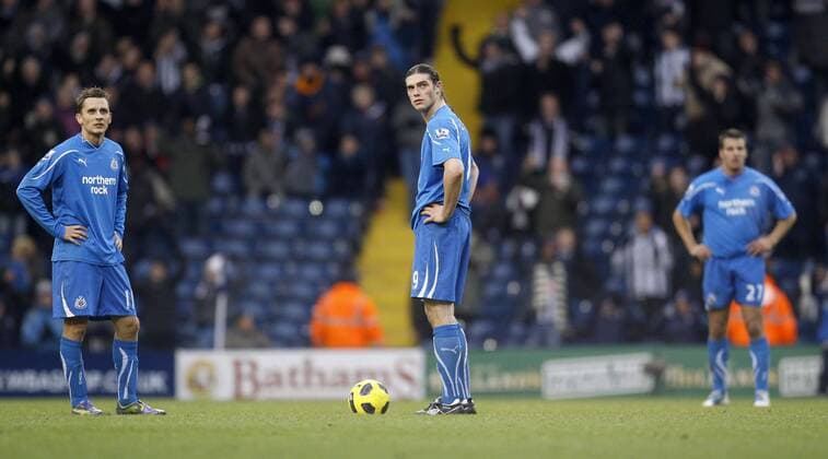 Peter Lövenkrands (l), Andy Carroll of Newcastle show their dejection following West Brom s third goal. - West Bromwich Albion (white) vs. Newcastle United (blue) EDITORIAL USE ONLY. No use with unauthorised audio, video, data, fixture lists, club league logos or live services. Online in-match use limited to 120 images, no video emulation. No use in betting, games or single club league player publications.
