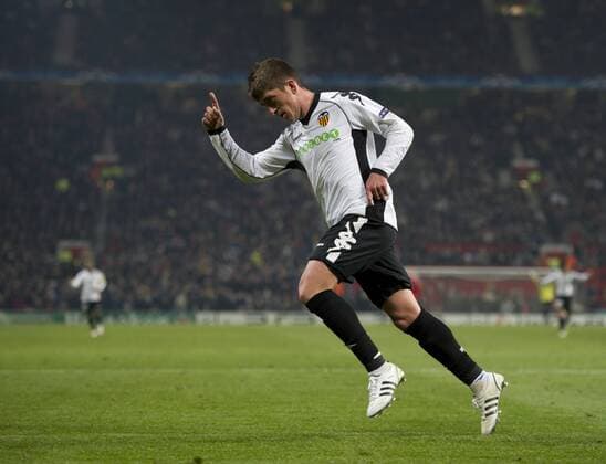 Pablo Hernandez of FC Valencia (white) celebrates scoring the first goal UEFA Champions League Group C Manchester United (ManU red) vs FC Valencia (white) 7th December, 2010 EDITORIAL USE ONLY. No use with unauthorised audio, video, data, fixture lists, club league logos or live services. Online in-match use limited to 120 images, no video emulation. No use in betting, games or single club league player publications. o0 Jubel Freude