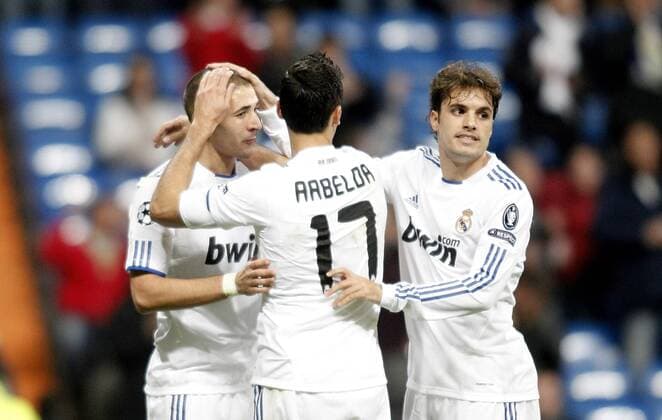 Real Madrid s Karim Benzema celebrates with Alvaro Arbeloa and Pedro Leon (L-R) - Real Madrid CF (white) vs AJ Auxerre - .  (201012087180)