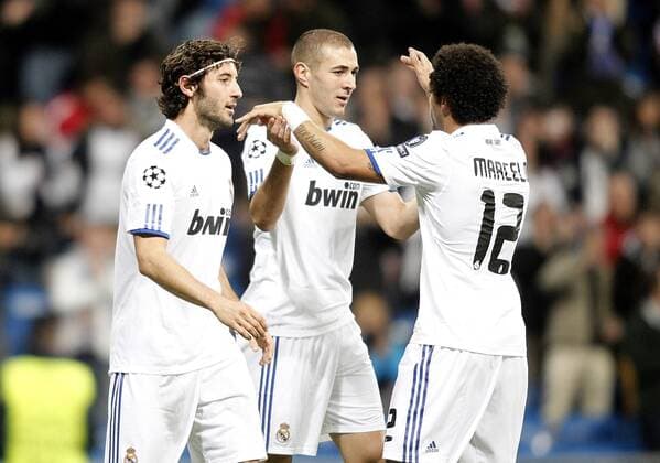 Real Madrid s Karim Benzema (C) celebrates with Esteban Granero (L) and Marcelo - Real Madrid CF (white) vs AJ Auxerre - .  (201012087184)