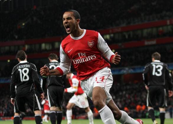 Arsenals Theo Walcott celebrates - Champions League: Arsenal FC (red) v Partizan Belgrade 8th December, 2010 - EDITORIAL USE ONLY. No use with unauthorised audio, video, data, fixture lists, club league logos or live services. Online in-match use limited to 120 images, no video emulation. No use in betting, games or single club league player publications.