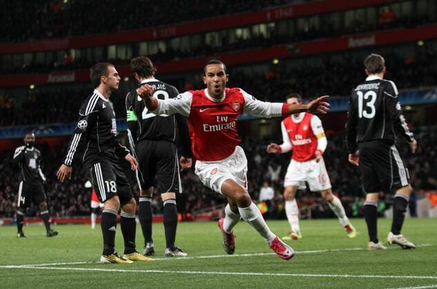 Arsenals Theo Walcott celebrates - Champions League: Arsenal FC (red) v Partizan Belgrade 8th December, 2010 - EDITORIAL USE ONLY. No use with unauthorised audio, video, data, fixture lists, club league logos or live services. Online in-match use limited to 120 images, no video emulation. No use in betting, games or single club league player publications.