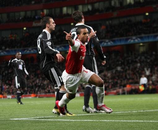 Arsenals Theo Walcott celebrates scoring his sides second goal - Champions League - Arsenal FC London - Partizan Belgrad - EDITORIAL USE ONLY. No use with unauthorised audio, video, data, fixture lists, club league logos or live services. Online in-match use limited to 120 images, no video emulation. No use in betting, games or single club league player publications.