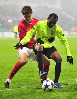 Zilina s Babatounde Bello, right, and Aleksandr Sheshukov of Spartak Moscow fight for ball during their Champions League Group F - MSK Zilina vs. Spartak Moscow 1:2. (CTKxPhoto JaroslavxPodhorsky)  CTKPhoto13201012081067501